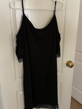 A line mini black dress with peak-a-boo shoulders